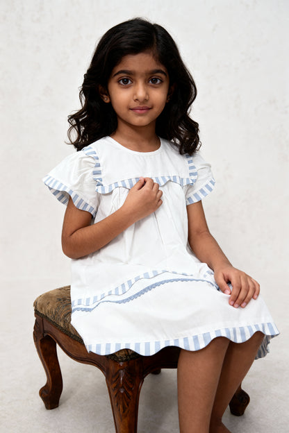 Santorini organic cotton flutter-sleeve girls dress back view showing clean lines