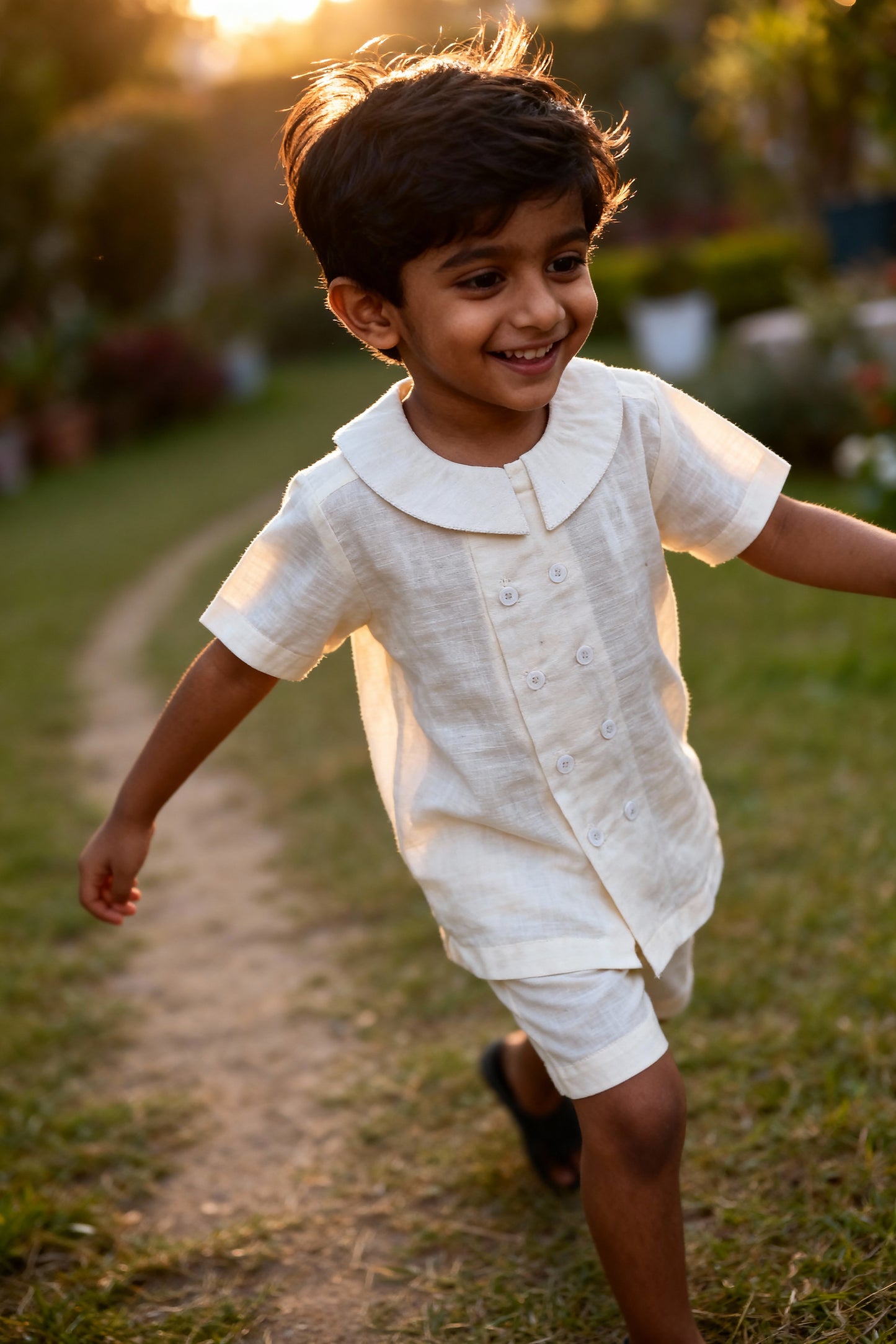 Oslo organic cotton-linen kids shirt front view showing cream tone and button placket