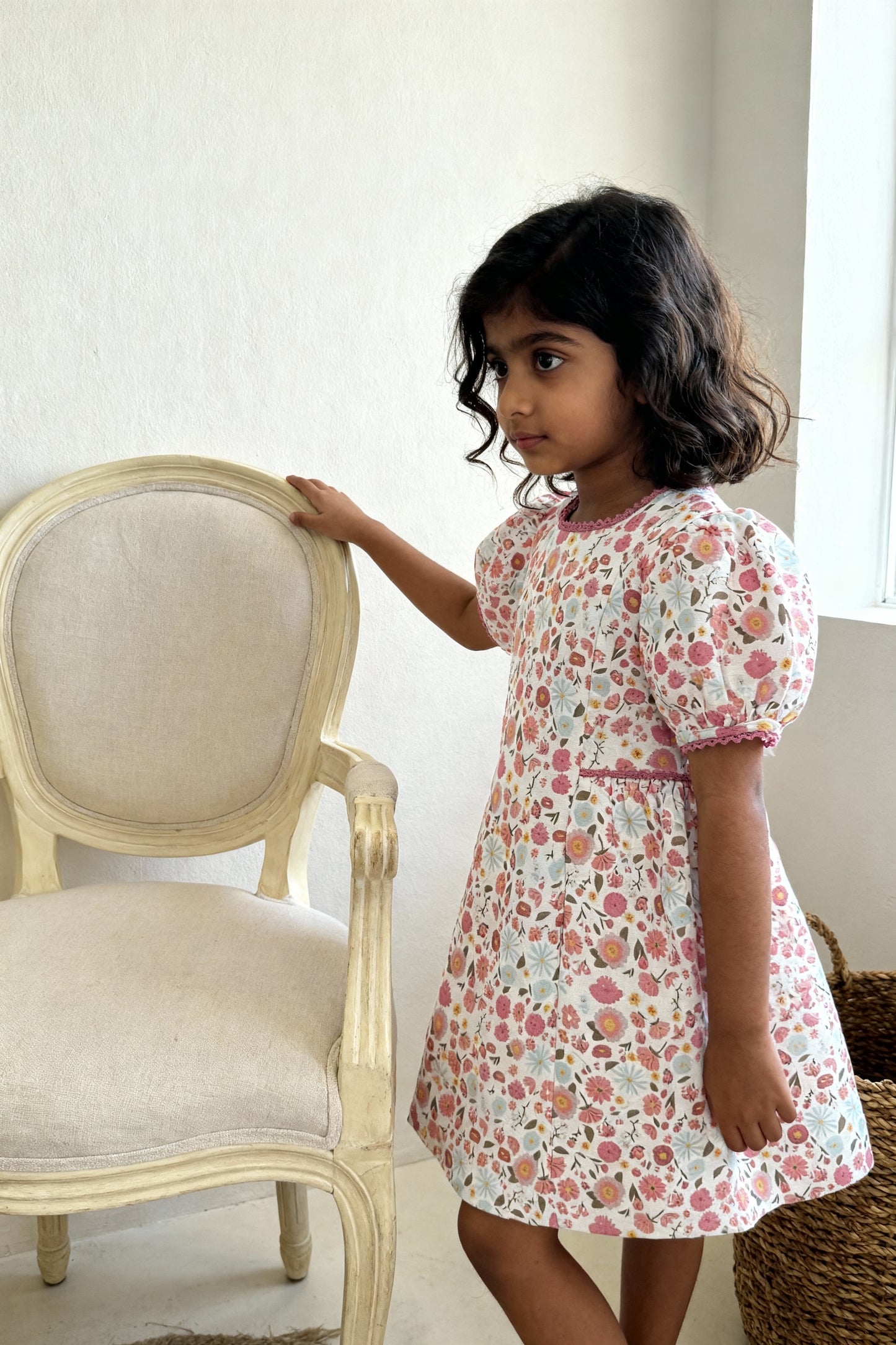Riviera Rose organic cotton-linen floral puff-sleeve girls dress close-up of floral print and puff sleeve
