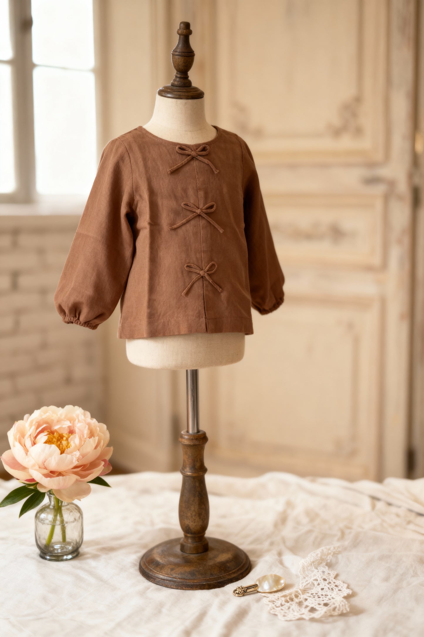 Cairo organic cotton-linen girls blouse front view showing soft earthy tone and relaxed fit