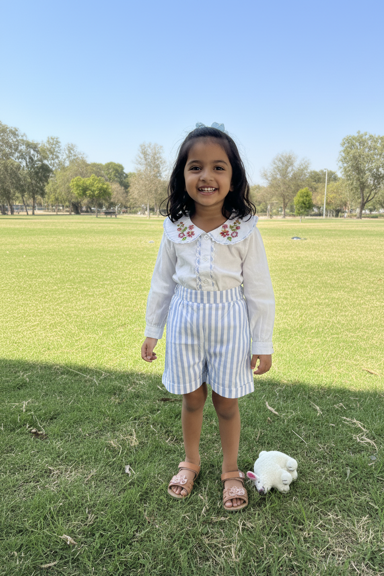 Nice organic cotton kids shorts side view showing relaxed unisex fit