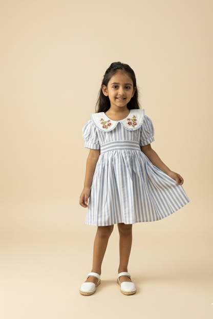 Portofino organic cotton smocked striped girls dress front view with hand-smocked bodice and tiered skirt