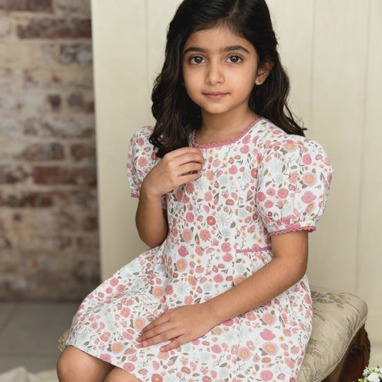 Riviera Rose organic cotton-linen floral puff-sleeve girls dress video showing twirl movement
