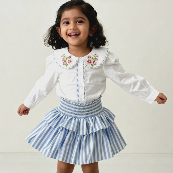Amalfi organic cotton girls skort video showing flowy double-tier movement and smocked waistband