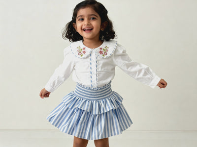 Amalfi organic cotton girls skort video showing flowy double-tier movement and smocked waistband