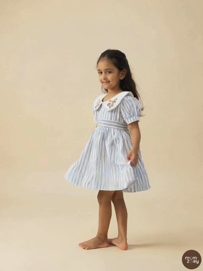 Portofino organic cotton smocked striped girls dress video showing movement and hand-smocked bodice detail